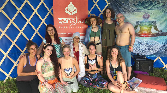 Manpreet Sangha with yoga followers